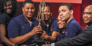 Morgan State University students pose with their trophy after winning  the 24th Annual Honda Campus All-Star Challenge at the American Honda Headquarters in Torrance, Calif., April 8, 2013. Morgan State University students of Baltimore, Md. take back $50,000 in grant money for their school, besting 47 other schools who competed in this years challenge. 