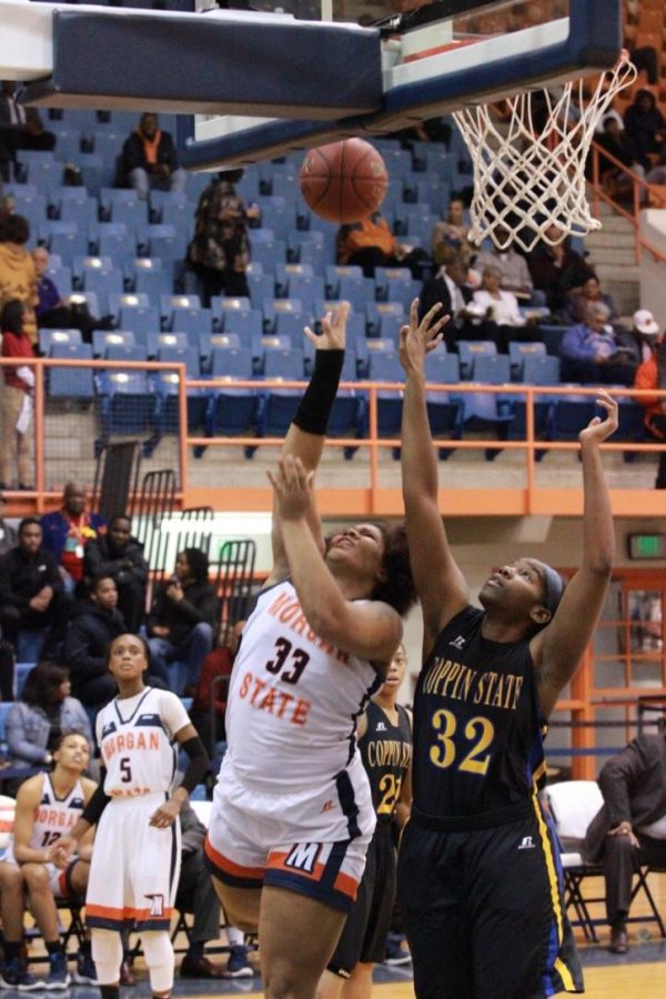 Sophomore Lexus Spears fights for a layup against Coppin State University on Monday night.
Photo by Terry Wright.