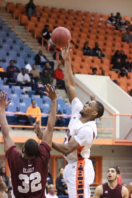 Senior Cedric Blossom puts up a layup against University of Maryland Eastern Shore.
Photo by Terry Wright.
