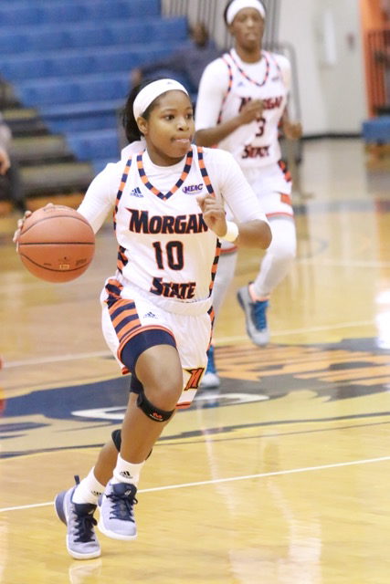 Freshman D'Jhai Patterson-Ricks drives down the court in a win against Washington Adventist University.
Photo by Terry Wright.