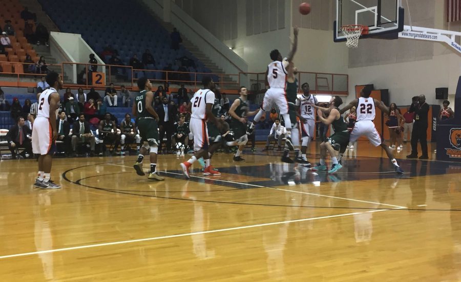 Tiwian Kendley attempts a layup in Tuesday's double overtime win against Manhattan.
Photo by Traevon Benjamin.