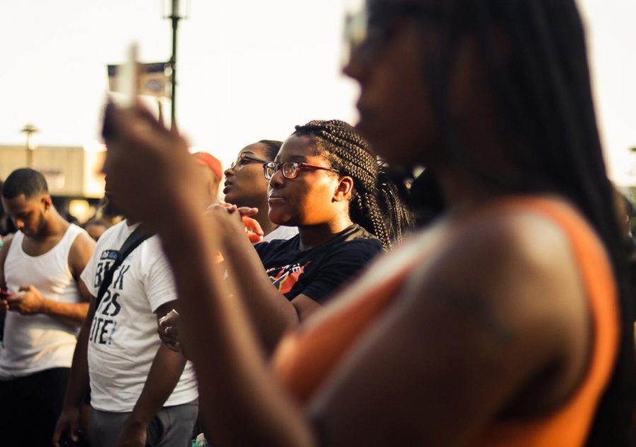 Morgan students stood outside of Holmes Hall to observe the prayer walk. 