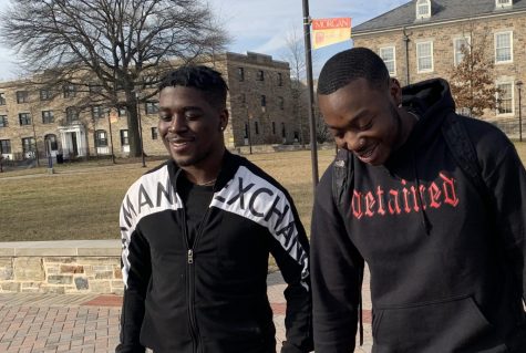 Kayode Akinyodu, a freshman screenwriting and animation major (right)
shares a laugh with his friend, Cyril Njoya, freshman information systems 
Major (left). 
