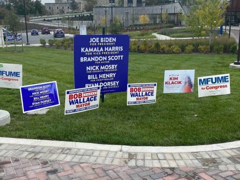 Political signs flood Morgan States lawn.