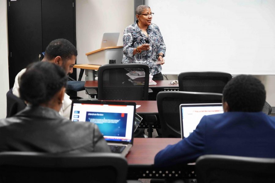 Dr. Lorece Edwards from the School of Community Health & Policy engaging in scholarship related to public health. 