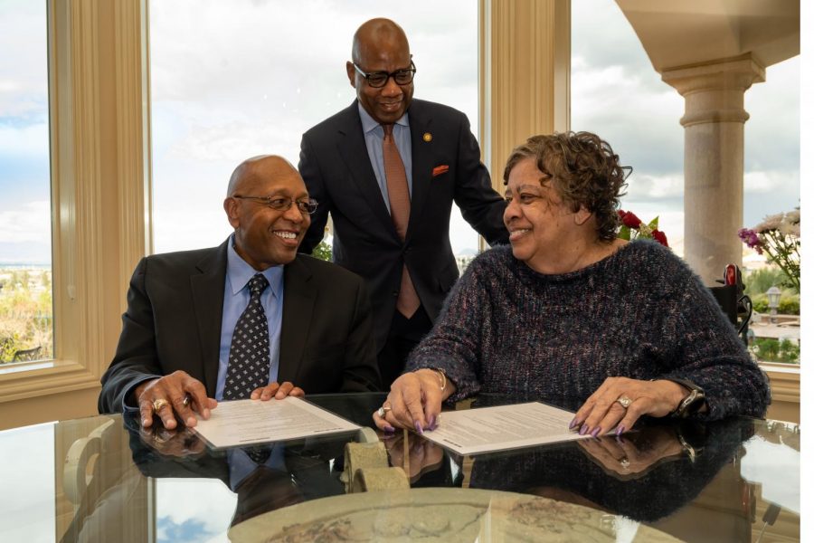 Calvin and Tina Tyler with University President David Wilson. 