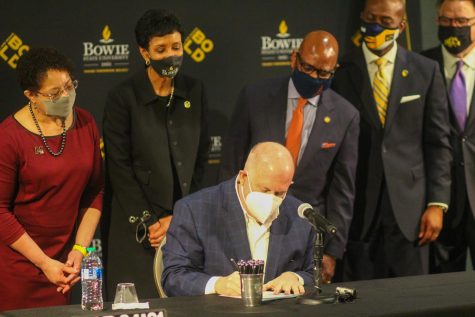 Gov. Hogan signs the bill surrounded by University of Maryland Eastern Shore President Heidi Anderson, Bowie State University President Aminta Breaux, Morgan State University President David Wilson, and Coppin State University President Anthony Jenkins.