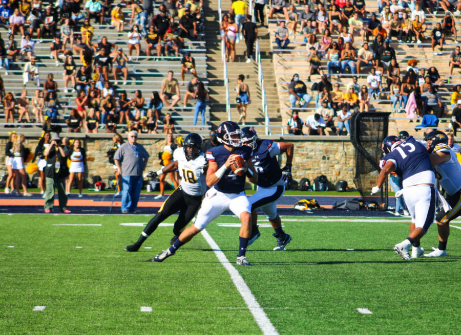 Neil+Bourdeau+in+his+first+game+as+starting+quarterback+against+Towson+University.