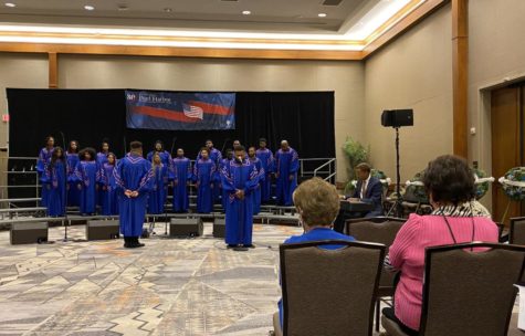 The Morgan Singers, approximately 40 voices, began their performance with the Black National Anthem, Lift Every Voice and Sing, then went on to perform pieces like I Know Ive Been Changed and Give Me Your Tired, Your Poor, and finally ended with The Battle Hymn of Republic. 