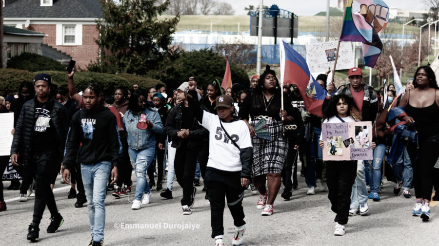Morganites gathered Friday afternoon to protest the death of Donnell Rochester.