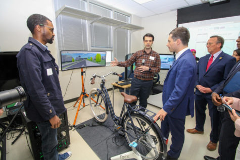 Transportation students showed Buttigieg some of their simulation projects during his tour.