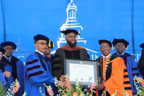 David E. Talbert, class of 1989 graduate, received an honorary degree from his alma mater alongside Congressman Kweisi Mfume and University President David Wilson.