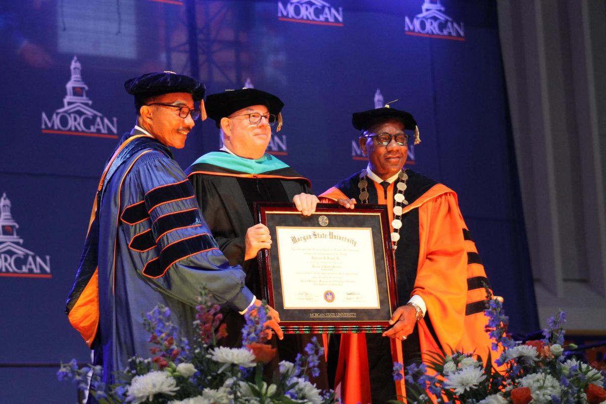 Former Maryland Governor Larry Hogan receives an honorary Doctorate of Public Service from the university.