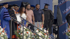 Rosalyn "Roz" Murray stands beside her family to accept a diploma on behalf of her daughter Kendall Murray during Morgan State University's spring 2024 commencement. Kendall Murray passed away in January 2024. (photo by Lillian Stephens, The Spokesman