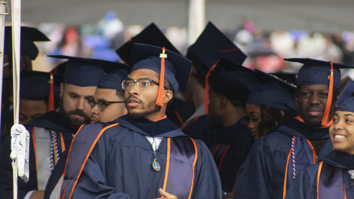 New college graduates patiently wait and celebrate their accomplishment during Morgan State Universitys Spring 2024 Commencement. (photo by Lillian Stephens, The Spokesman)