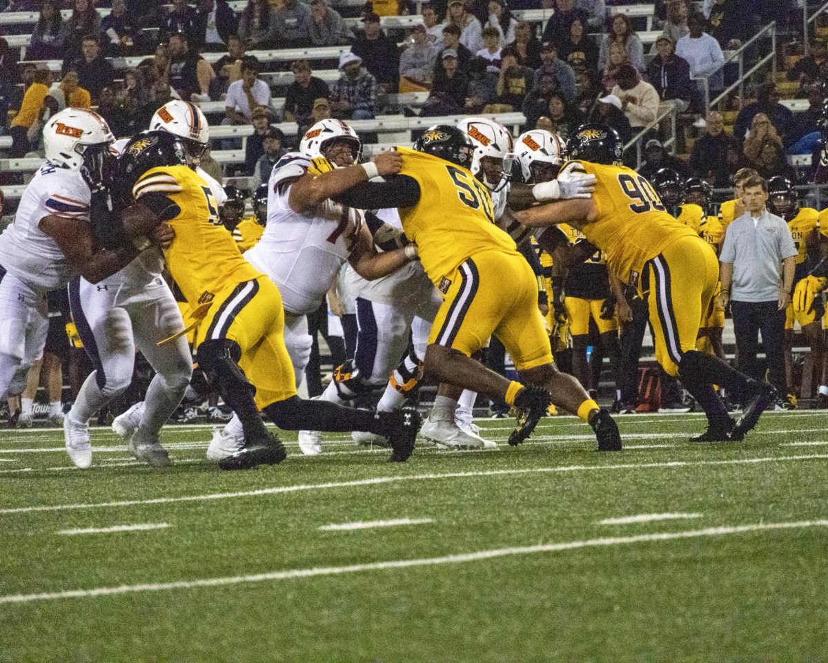 Morgan's Offensive line engaging with Towson's Defensive line