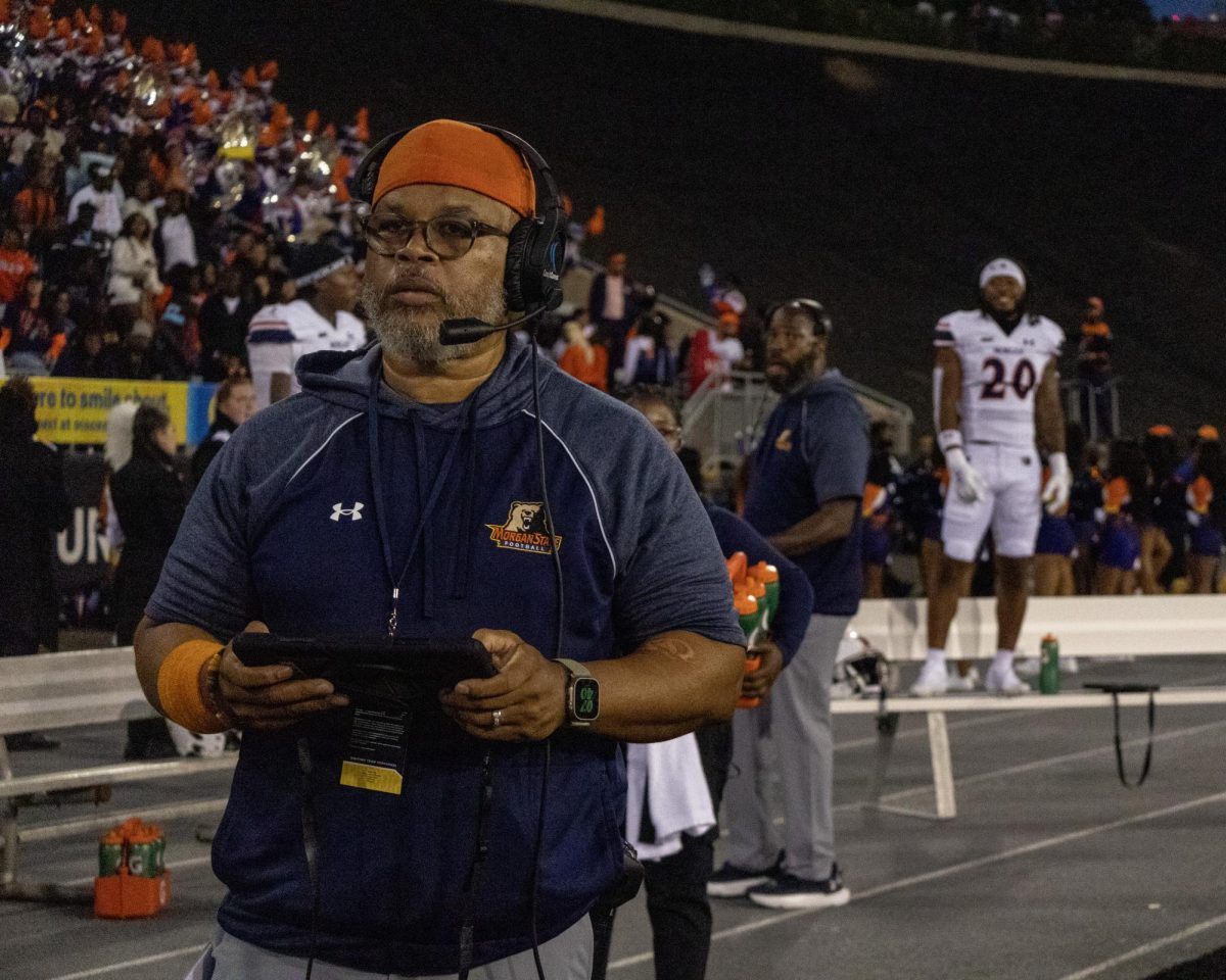 Morgan State Bears face Tigers in the 23-24 Battle for Tredell Dorsey, strength and condition coach for Morgan State University's football team, watches field as during Greater Baltimore on Sept. 7. 