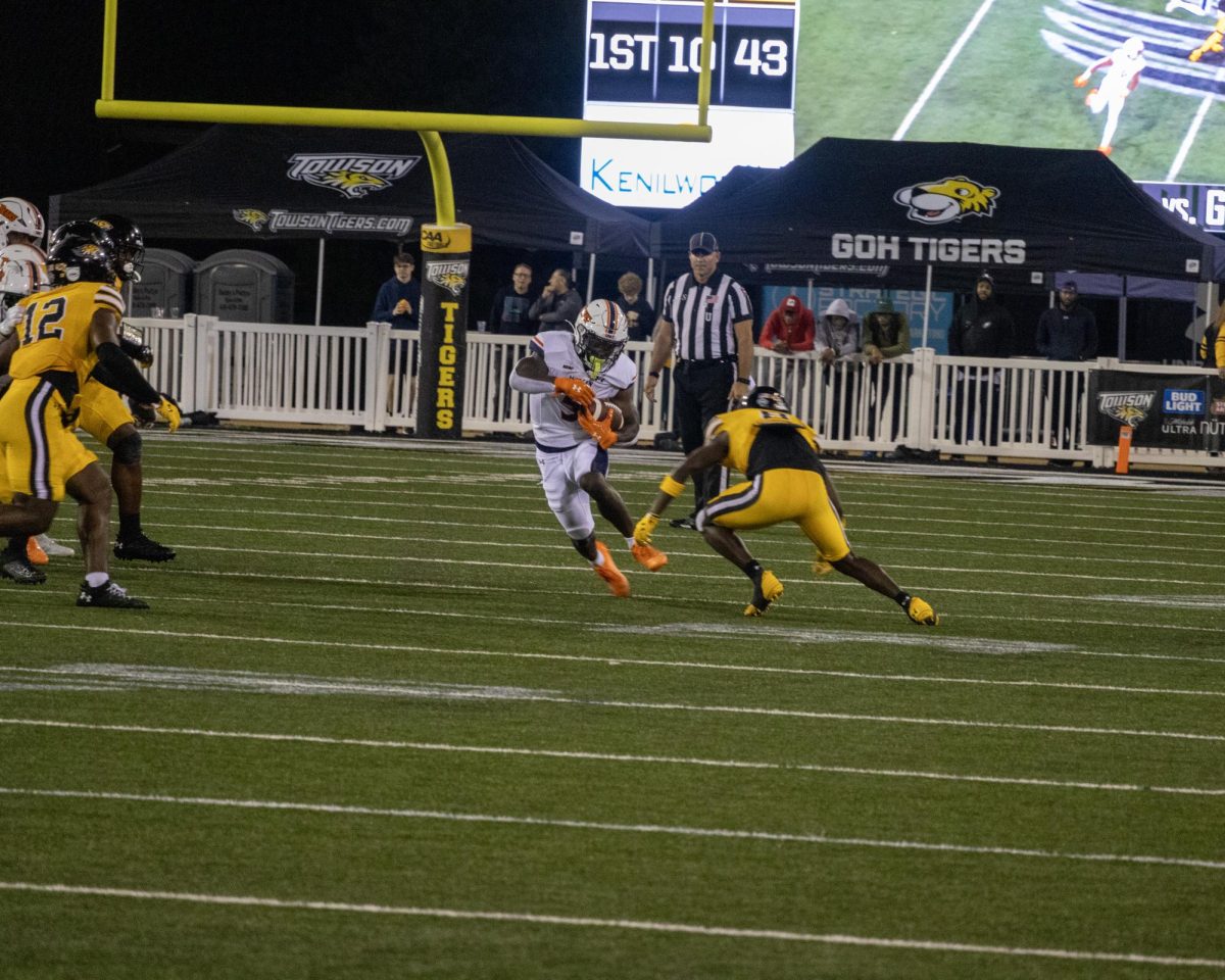 Senior runningback Myles Miree makes a move in open space vs Towson University 