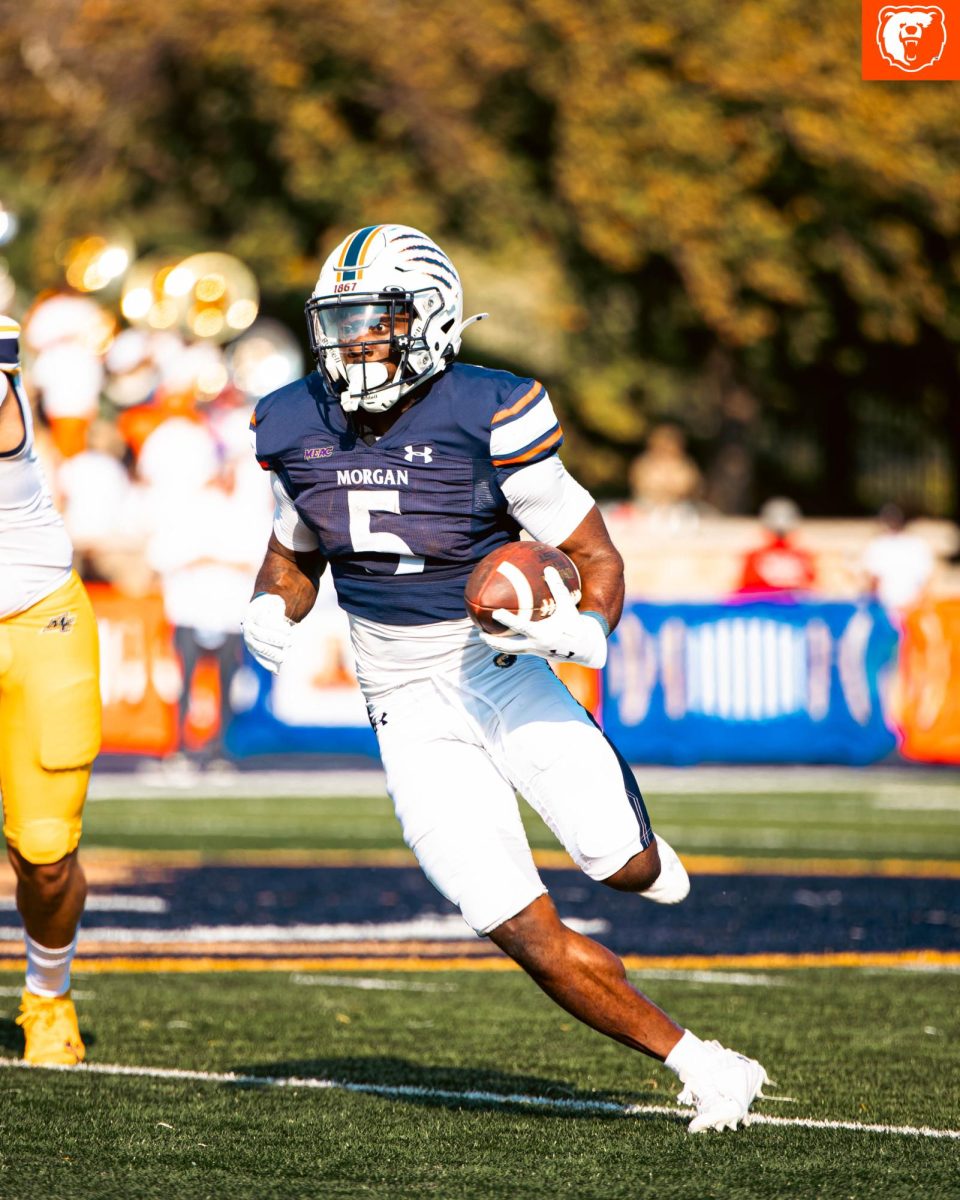 Running back Myles Miree looking for running room vs Merrimack. 