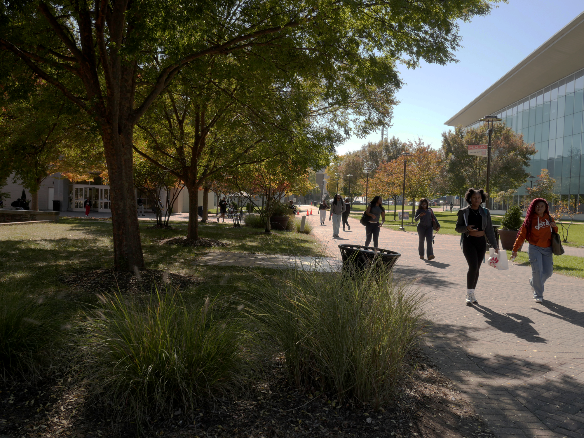 Students walk by the Earl S. Richardson Library at Morgan State University.