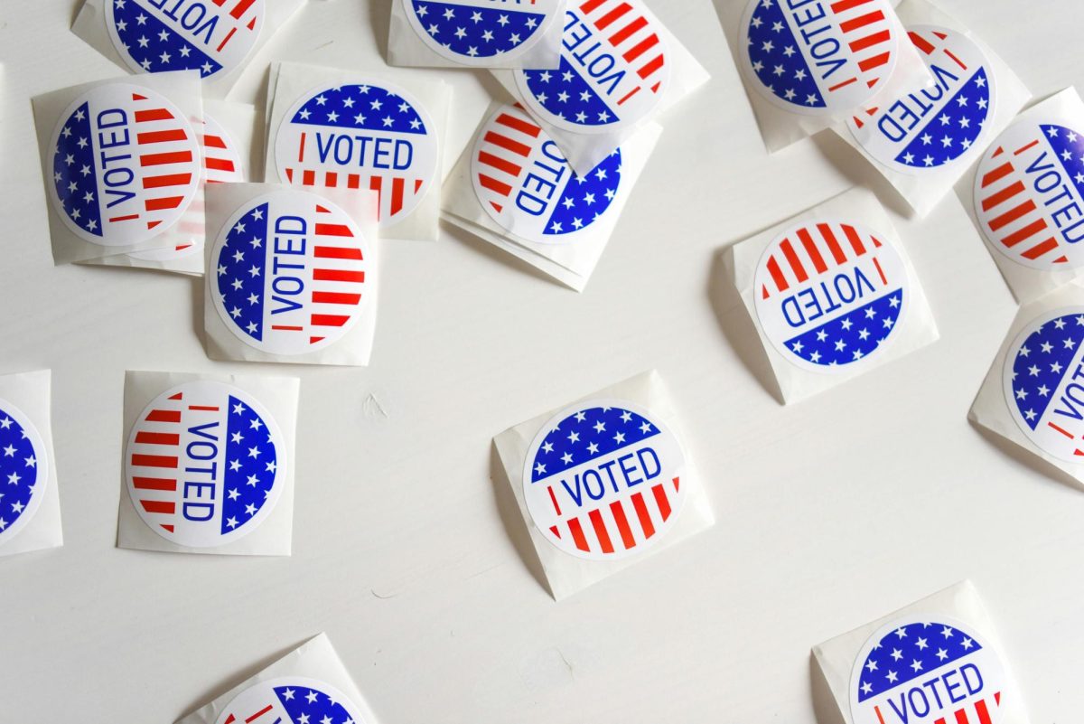 "I voted" stickers rest on a table. Polling places share these stickers and others with similar designs to voters who have cast their ballots