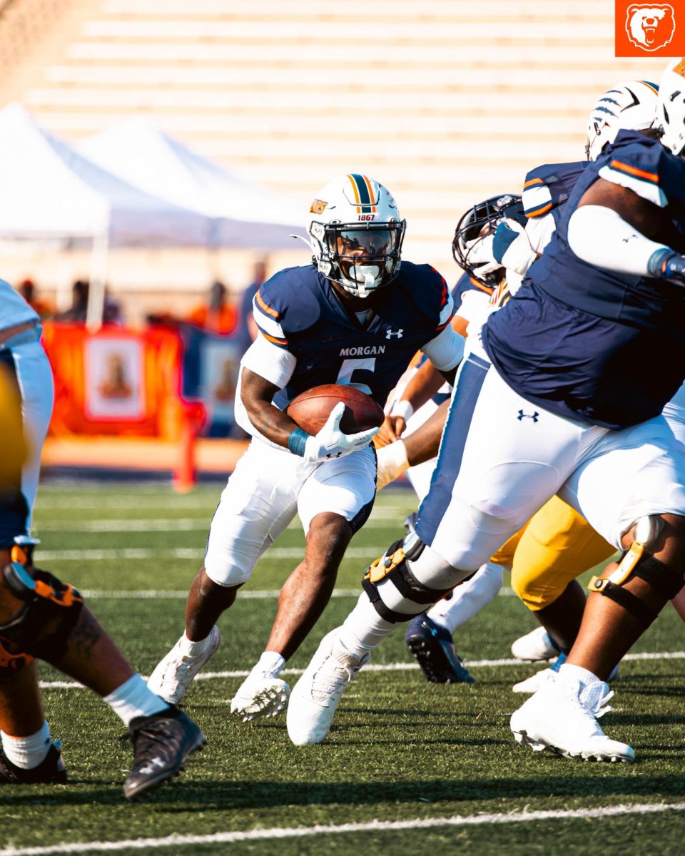 Running back Myles Miree looks for running room. 