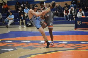 Cort Vann doing a back heel trip vs Johns Hopkins.