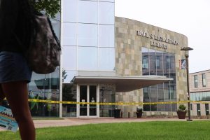 Morgan State University student walks past an evacuated Earl S. Richardson Library on Tuesday, Sept. 30, 2025. 